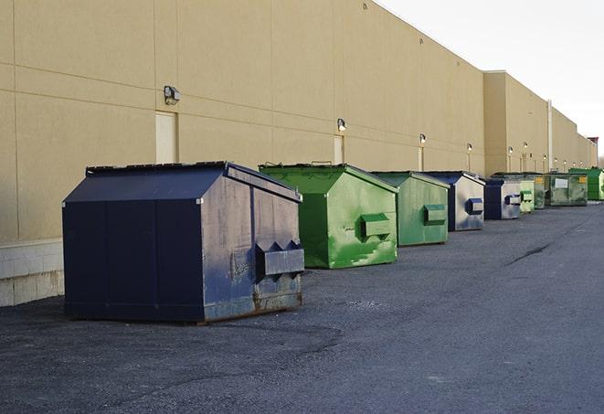 a large metal bin for waste disposal on the construction site in Agua Dulce, CA